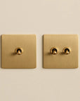 Aurel - interruptor de pared en latón